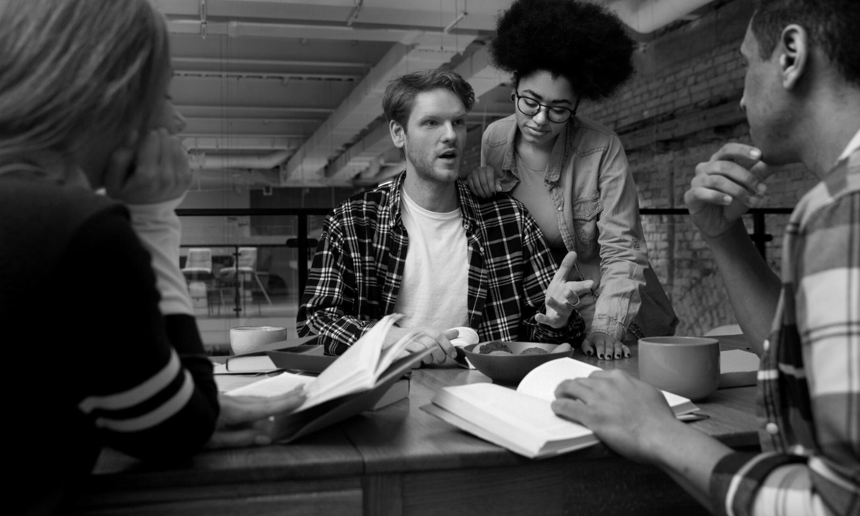 Financial professionals analyzing capital budgeting scenarios